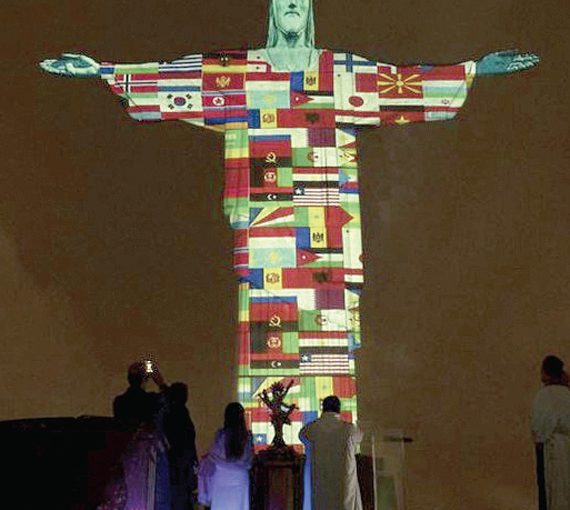 Redeemer statue lights up with coronavirus-affected countries’ flags